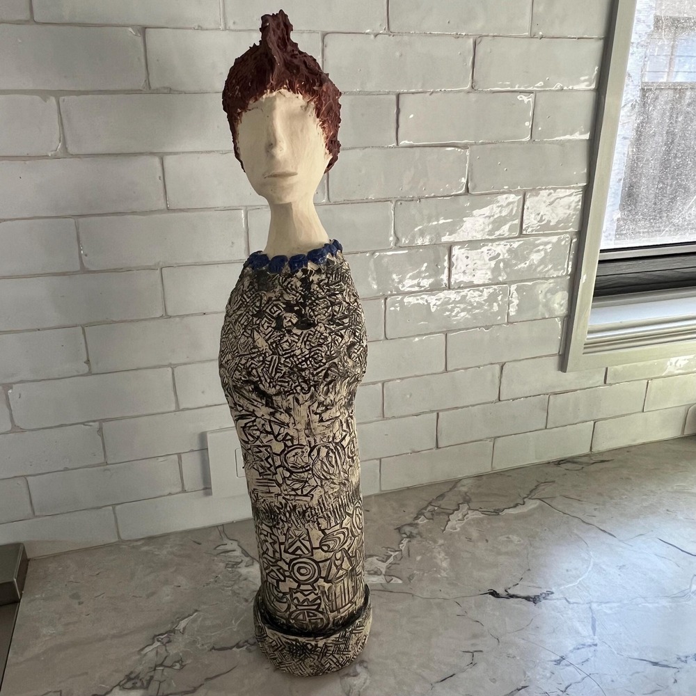 Unique handmade sculpture of a woman with‎ a Mohawk